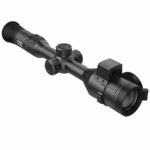 A rifle scope with an illuminated sight on it.