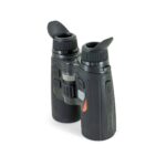 A pair of binoculars with the same type of lens on top.
