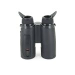 A pair of binoculars with the same lens on top.